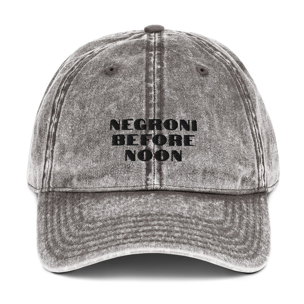 Charcoal grey vintage cotton twill cap with a curved brim and adjustable strap, featuring subtle stitching details.