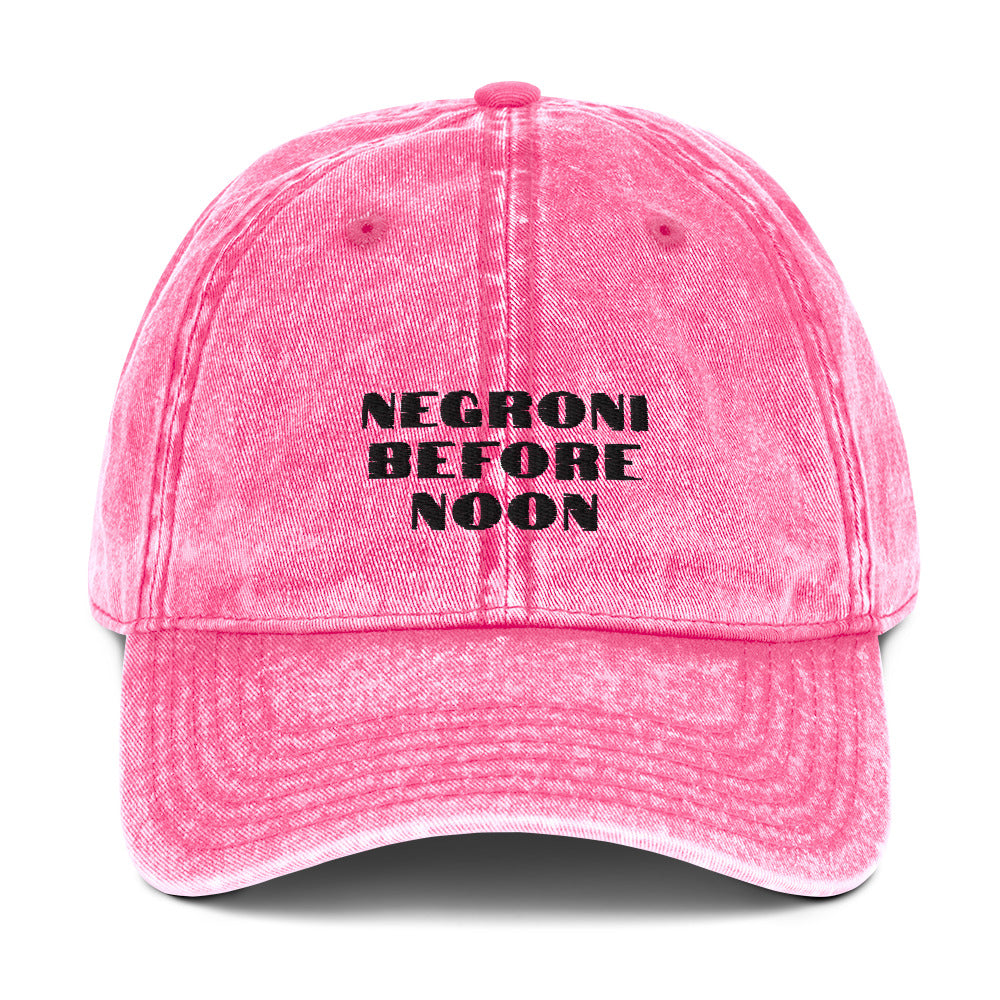 Pink vintage cotton twill cap with a classic design, featuring a curved brim and adjustable strap from Fine Spirits Consulting.