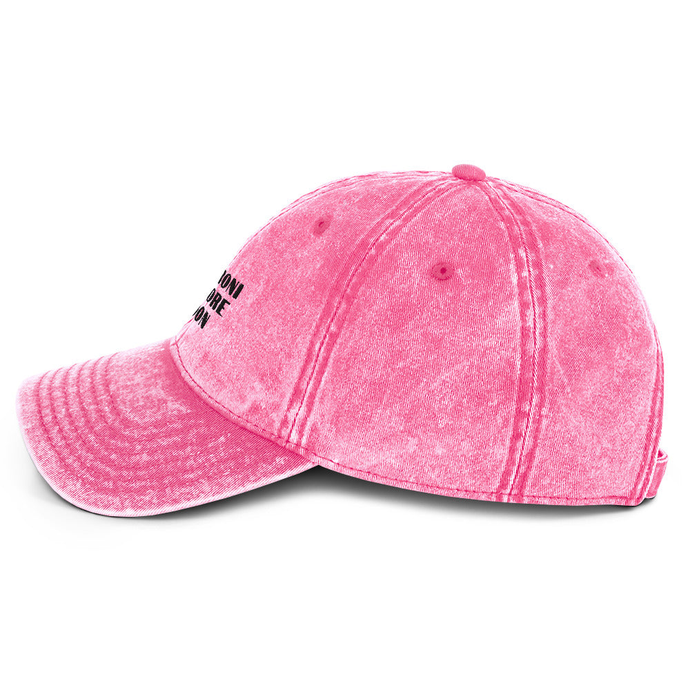 Pink vintage cotton twill cap from Fine Spirits Consulting, shown from the left side with a classic, casual style.