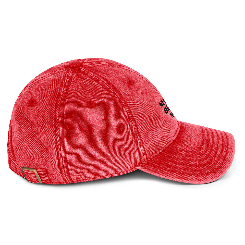 Red vintage cotton twill cap from Fine Spirits Consulting shown from the right side with a classic design and structured fit.